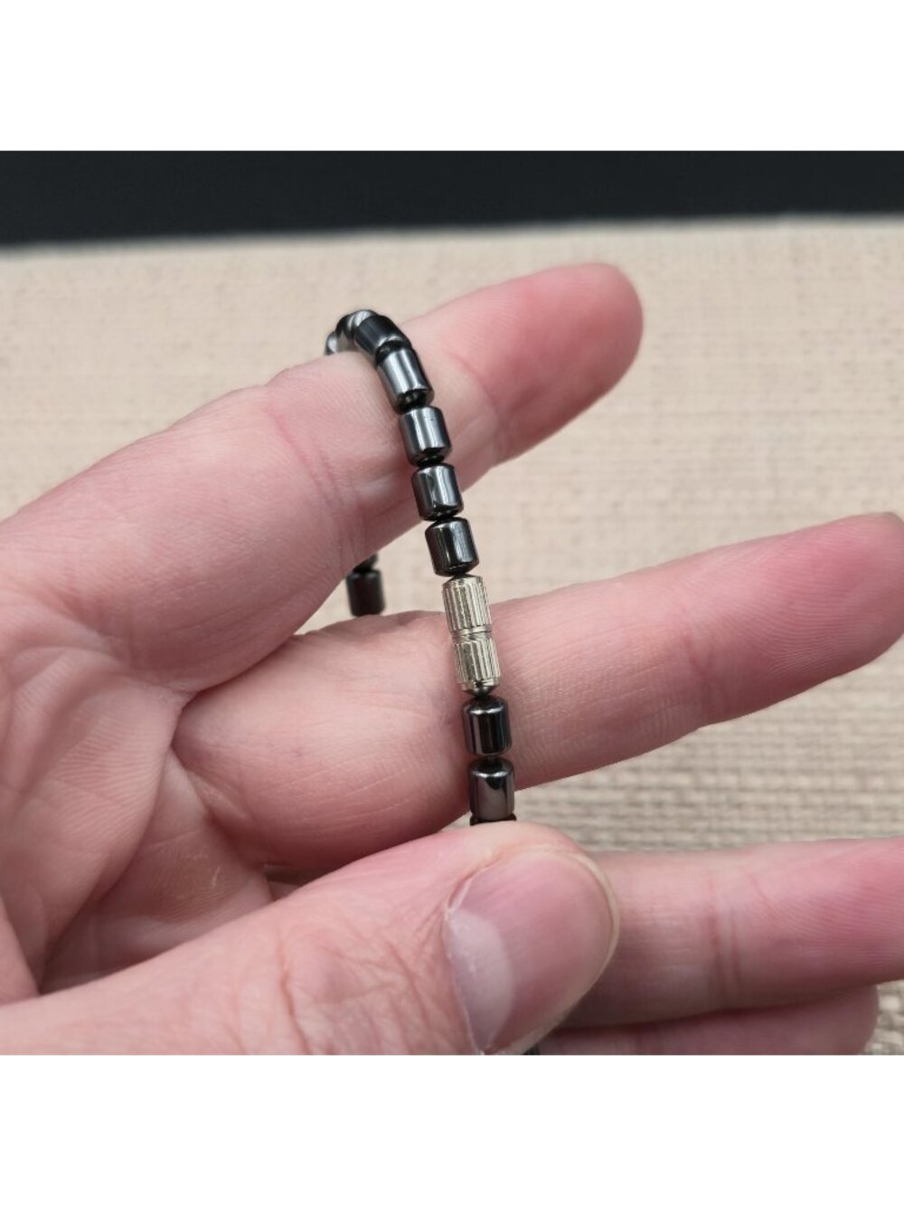 7 Inch Hematite Cylinder Bracelet with Light Blue Cat's Eye Focal Bead Bracelet - Picture 4 of 6